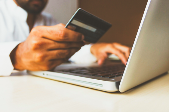 Paying with your card online using a laptop